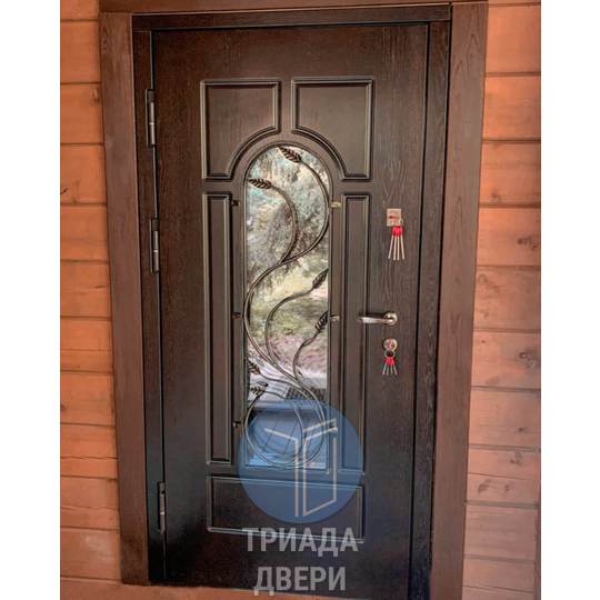трехконтурная дверь с ковкой на дачу - фото 2